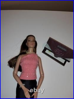Classy Tonner1990 Tyler Wentworth Collection, wearing a pink top, black skirt