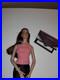 Classy Tonner1990 Tyler Wentworth Collection, wearing a pink top, black skirt