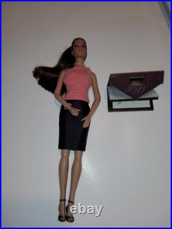 Classy Tonner1990 Tyler Wentworth Collection, wearing a pink top, black skirt