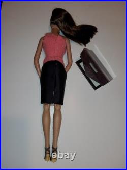 Classy Tonner1990 Tyler Wentworth Collection, wearing a pink top, black skirt